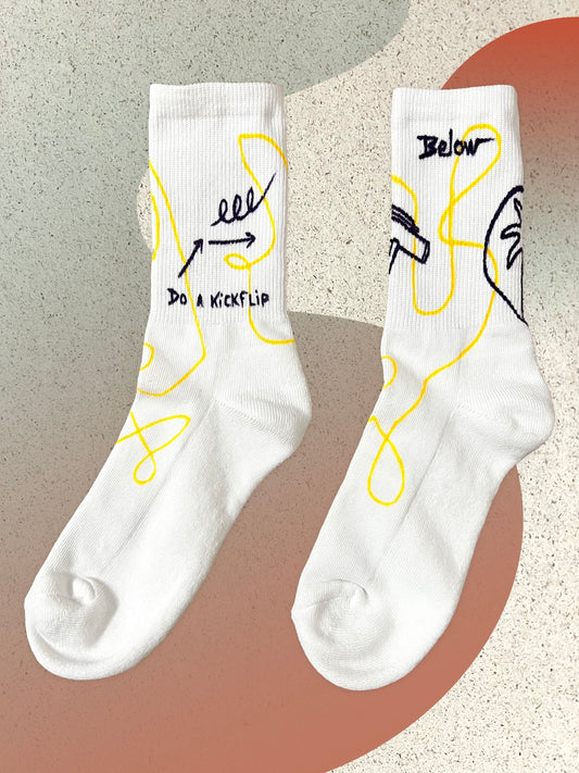 Below Socks "Do a Kickflip"